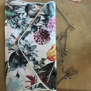 Floral print clutch with chain